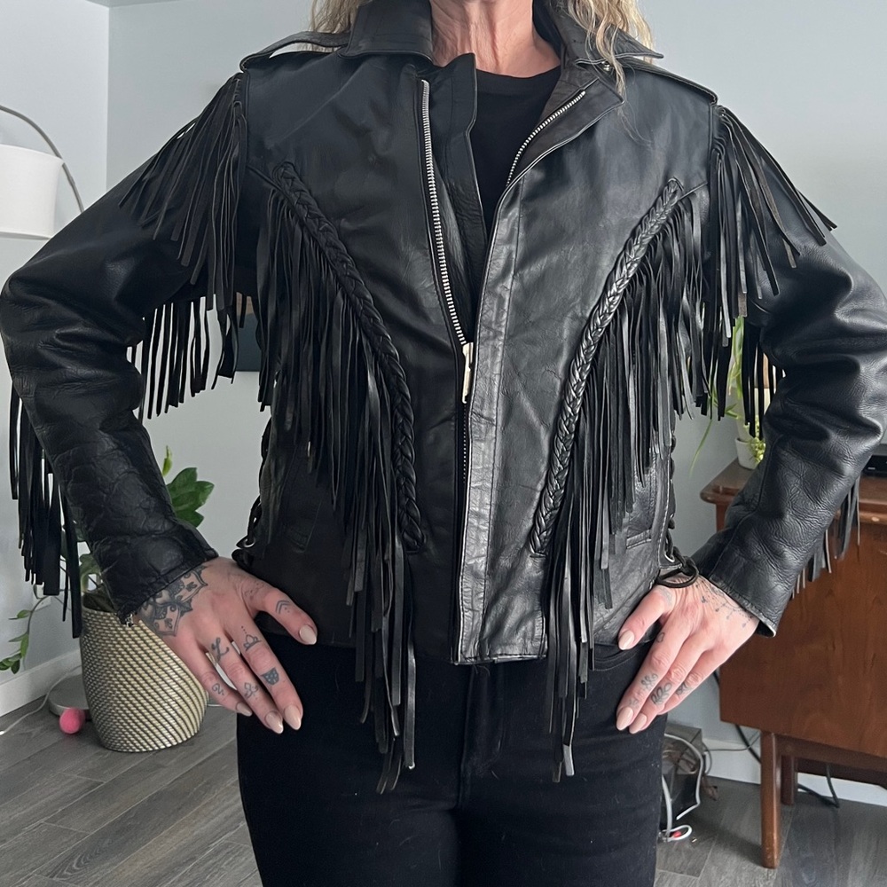 Vintage leather biker jacket braded with fringe